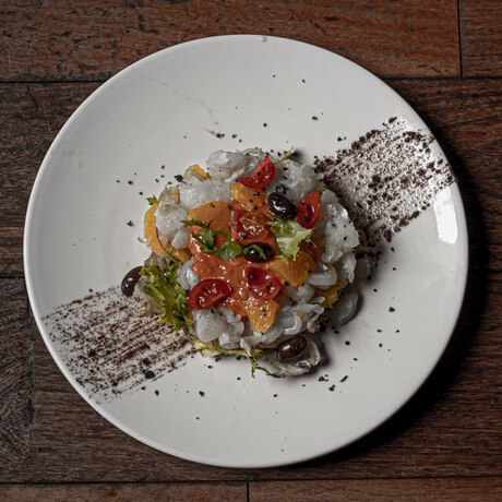 Cod salad with orange and romesco