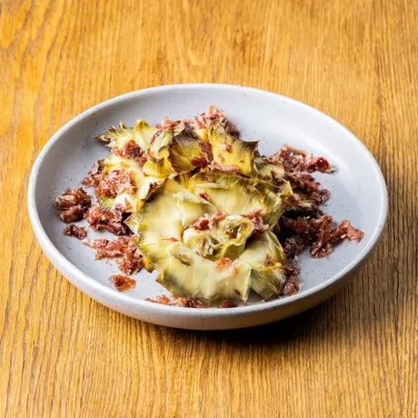 Candied artichokes with Iberian shavings