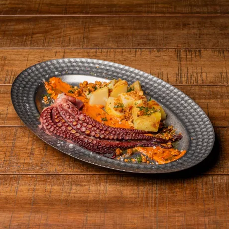 Octopus with Vera's red pepper aioli and "romesco migas"