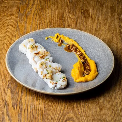 Grilled monkfish and pumpkin purée